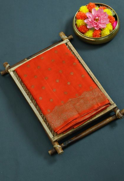 Elegant Saffron Silk-cotton Saree with Subtle Buti Detailing
