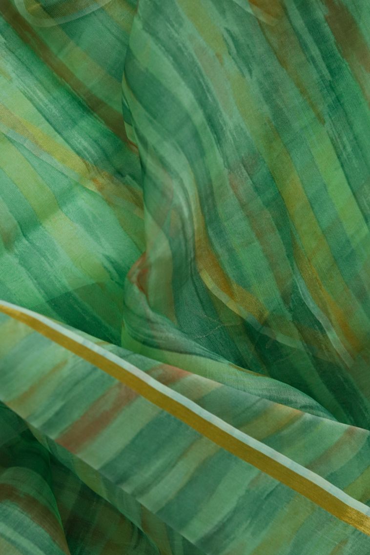 Stylish Soft & Flowing Saree in Green view 3