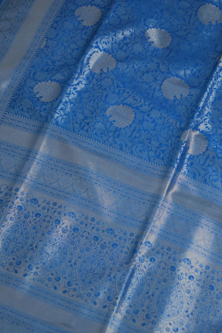 Elegant Peacock Blue Semi-silk Saree with Floral Detailing view 2