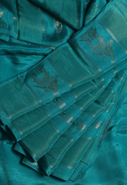 Designer Banarasi Saree in Peacock Blue with Elegant Abstract Motif Border