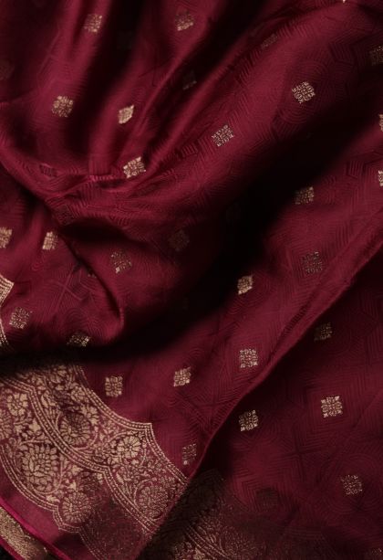 Elegant Maroon-red Banarasi Saree with Subtle Buti Detailing