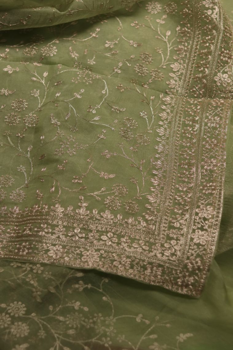 Elegant Moss Green Organza Saree with Subtle Floral Detailing view 2